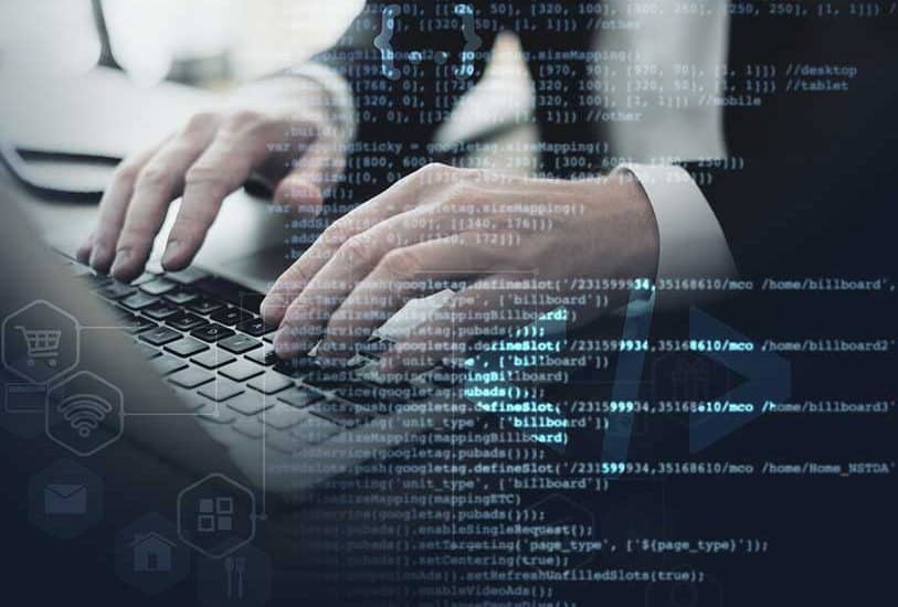 Mans at laptop typing page metadata